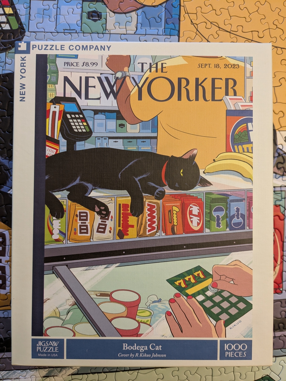 New York Puzzle Company 1000 Piece Bodega Cat Jigsaw Puzzle